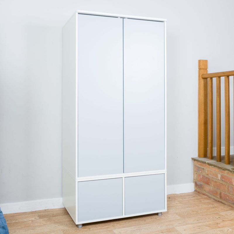 Wardrobe unit with storage drawer