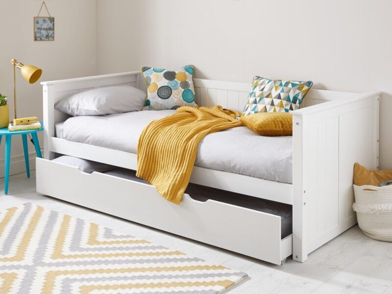 White-painted day bed with guest bed base