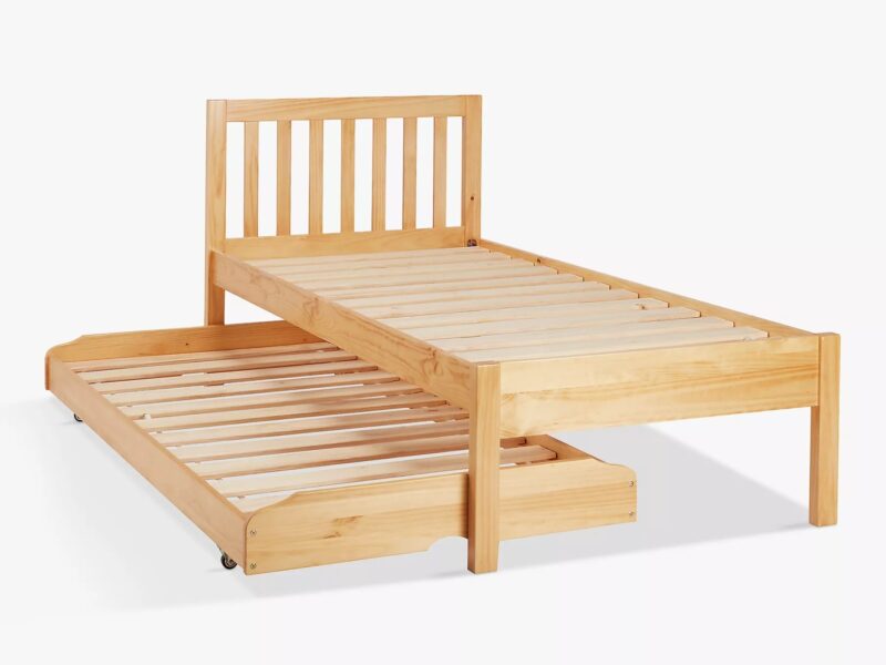 Natural wood finish bed frame with roll-out trundle base