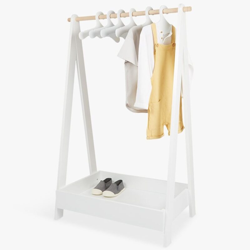 White-painted clothes rail with storage tray in the base