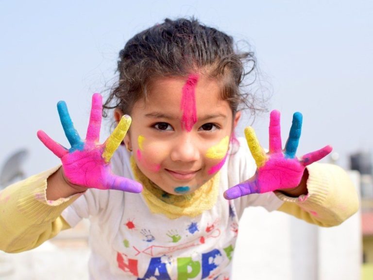 Child with painted hands