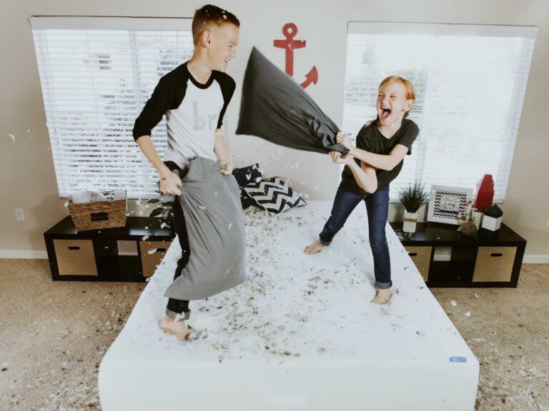 Kids having a pillow fight