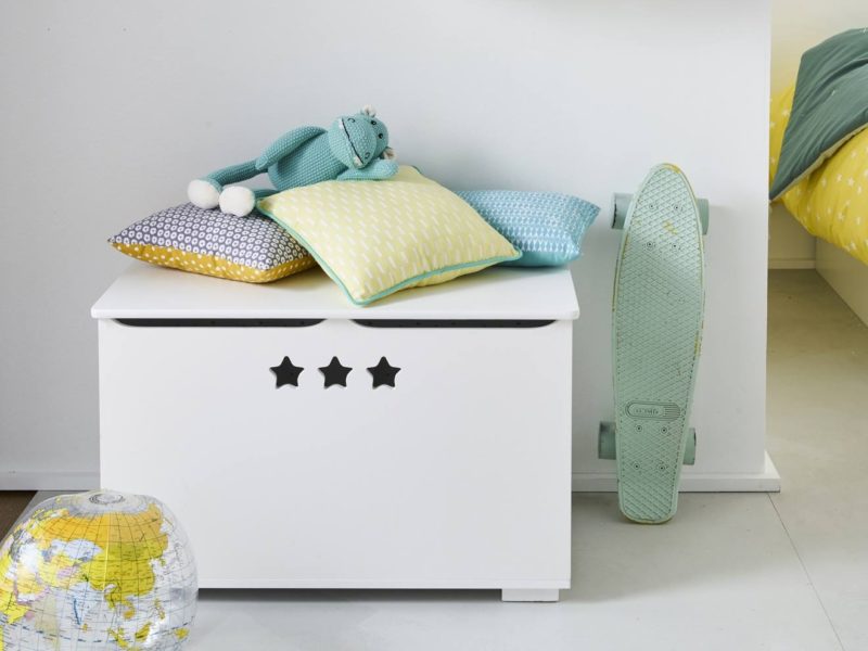 White toy chest with star cut-outs