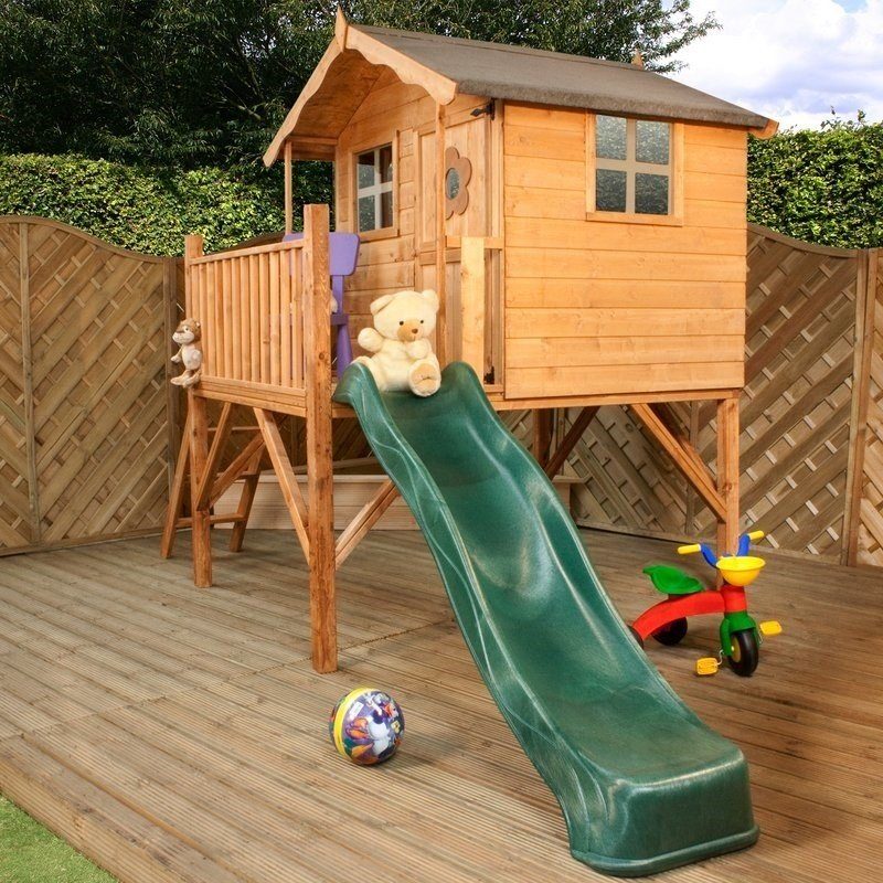 Elevated playhouse with a slide