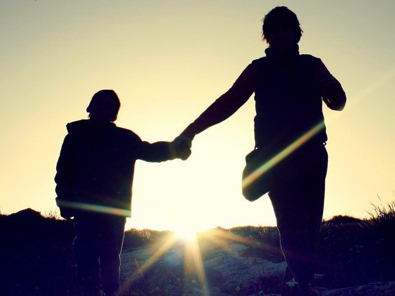 Parent walking with child