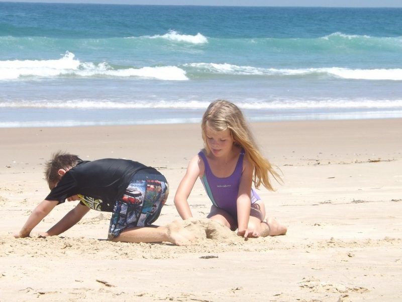 Kids playing on the beach