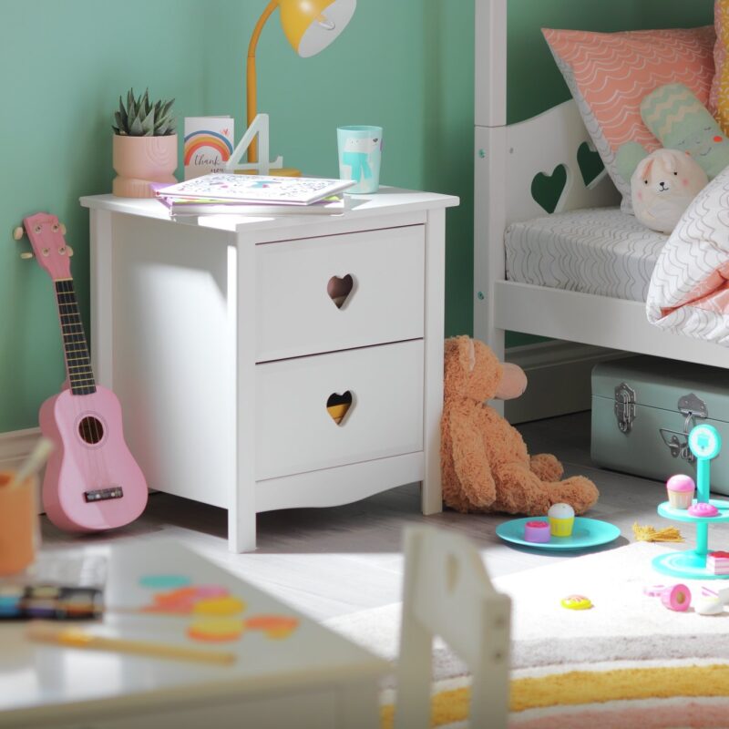 White bedside cabinet with heart-shaped cut-outs