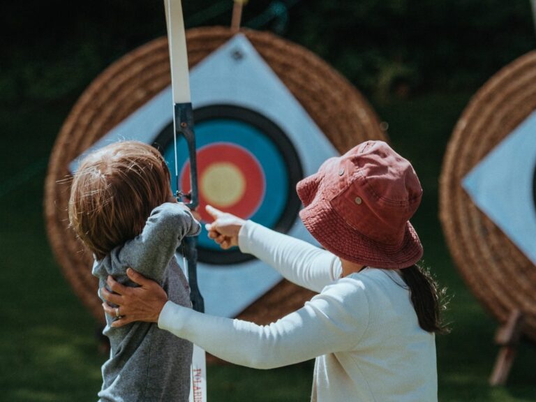 Child taking aim at the target