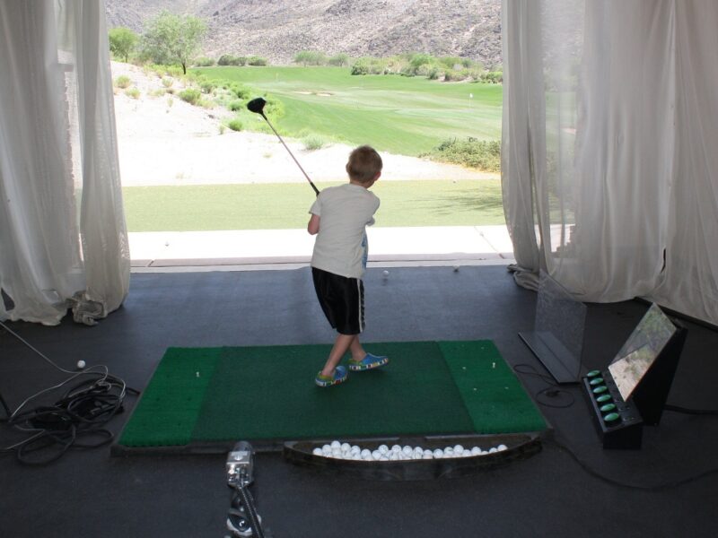 Child playing golf