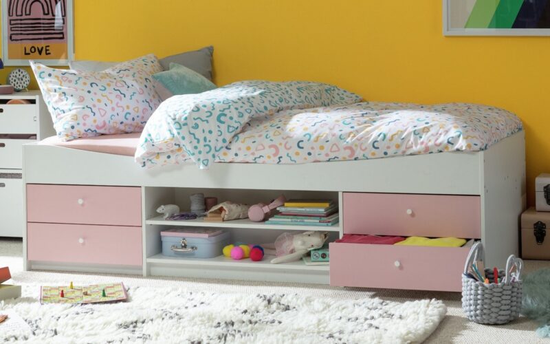 Pink and white cabin bed