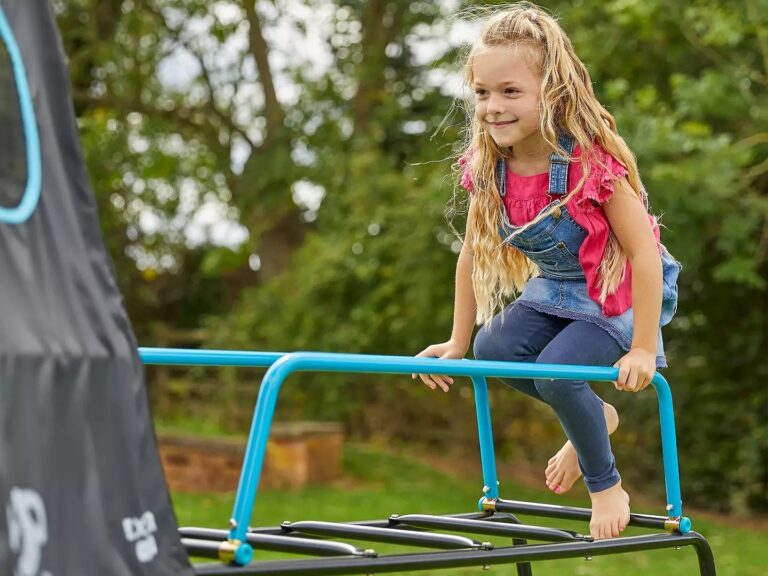 Girl on a climbing frame