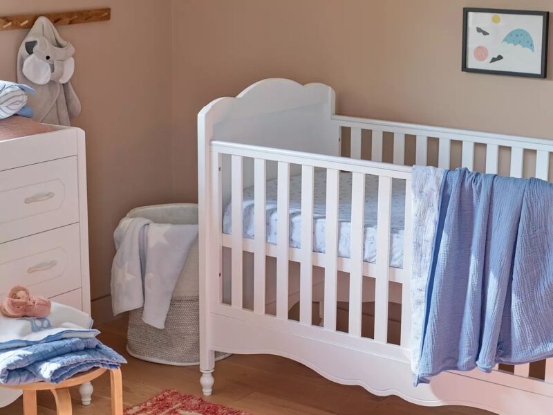 White-painted cot bed