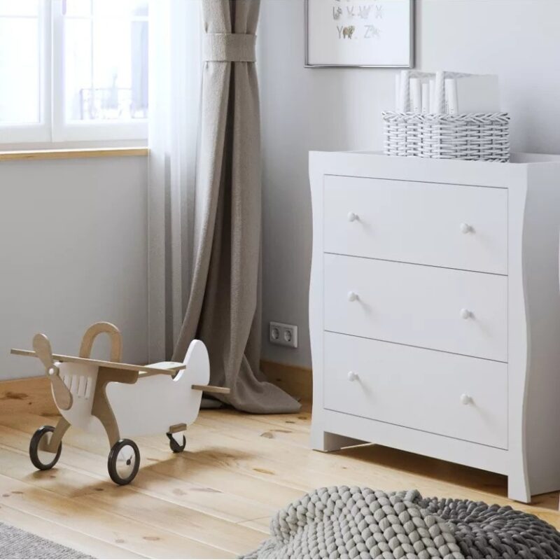 White-painted sleigh-style dresser unit