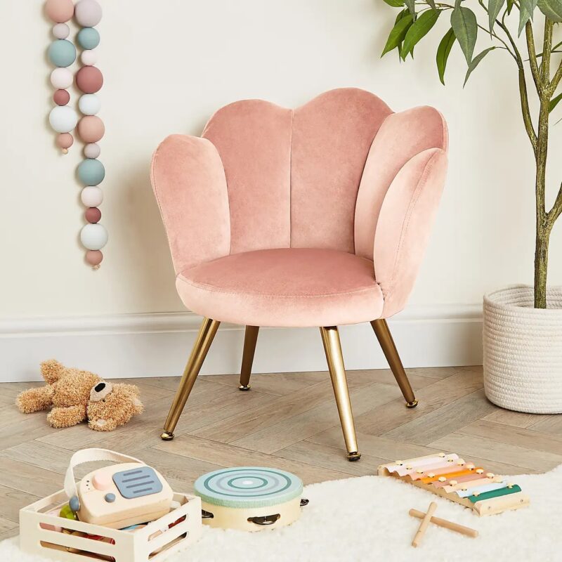 Pink velvet upholstered kids chair with gold coloured legs