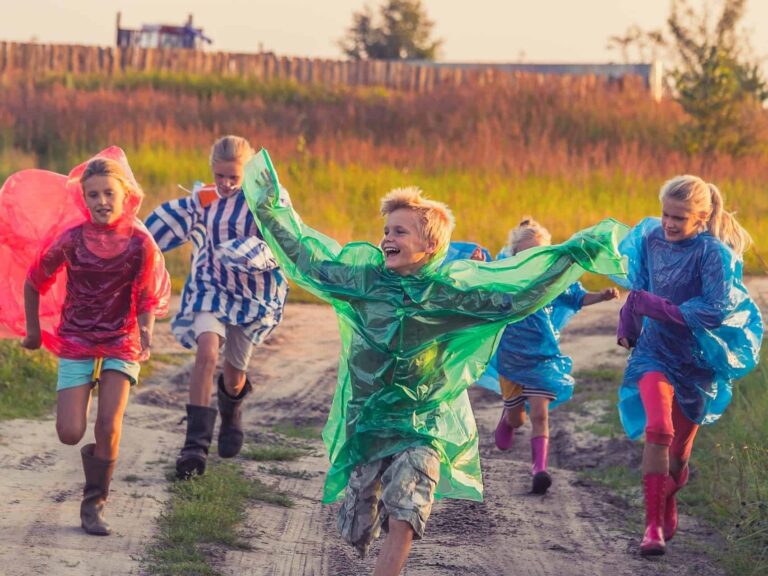 Children playing in the rain