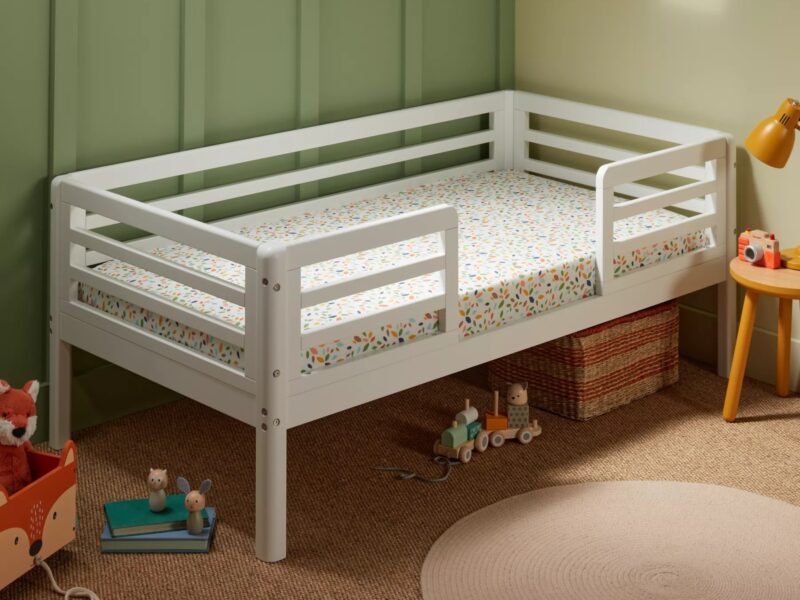 Toddler bed with white-painted finish