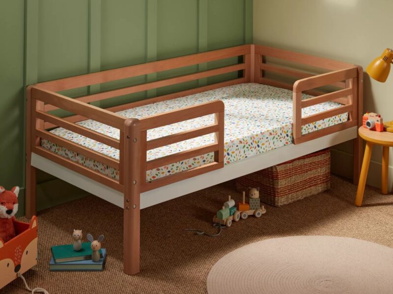 Toddler bed with natural wood finish