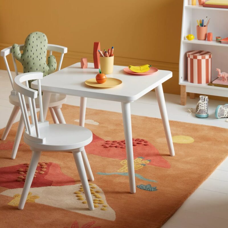 White-pained play table with a pair of spindle chairs