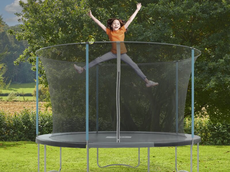 Large round trampoline with safety net