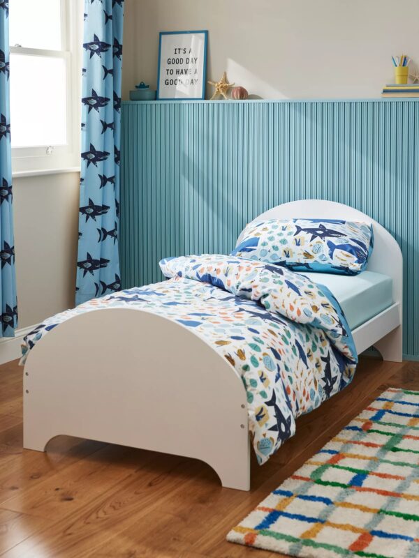 White bed frame with curved head and foot board