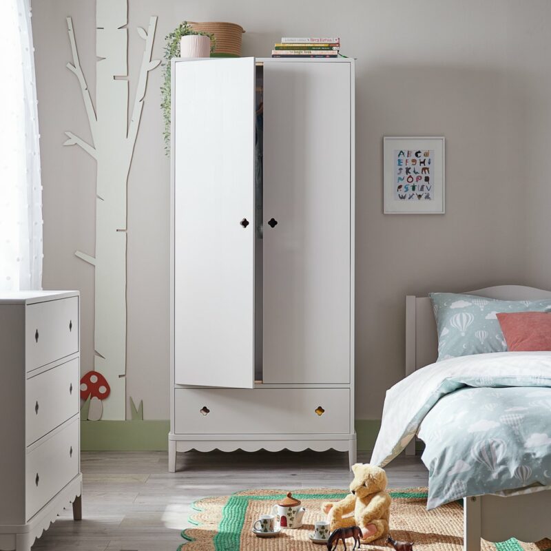 Grey painted wardrobe with cut-out handles and scallop detailing