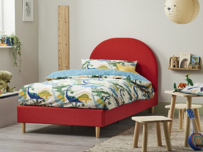 Child's single bed frame with orange fabric upholstery